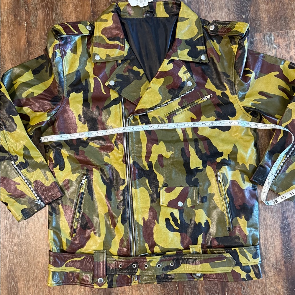 Camo 100% leather jacket! Price to sell quick .  Size 50 inch chesr